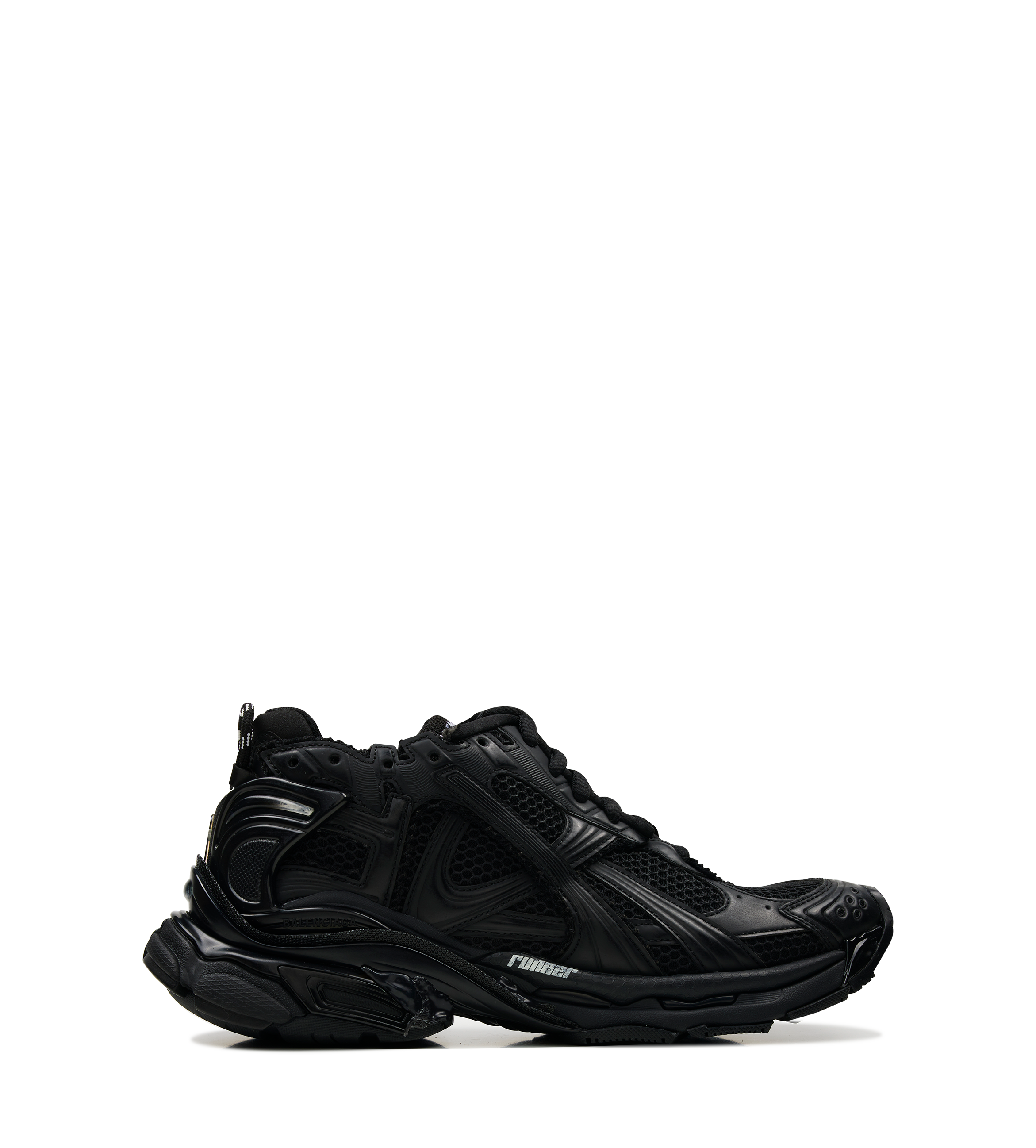 Balenciaga Runner Sneaker in black mesh and nylon with distressed worn-out effect, logo details, and layered construction.