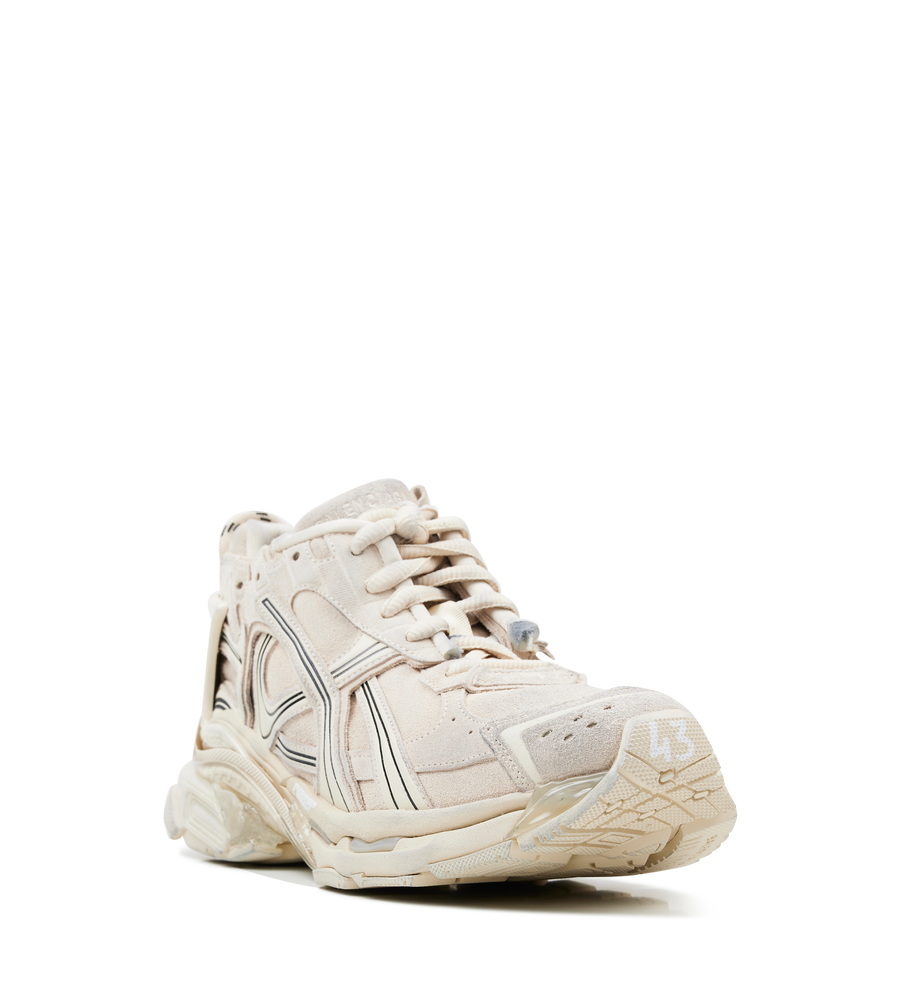 Balenciaga Suede Runner Sneakers in beige suede with distressed finish and embroidered logo.