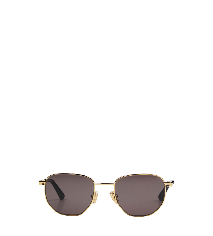 Gold-framed sunglasses with dark lenses