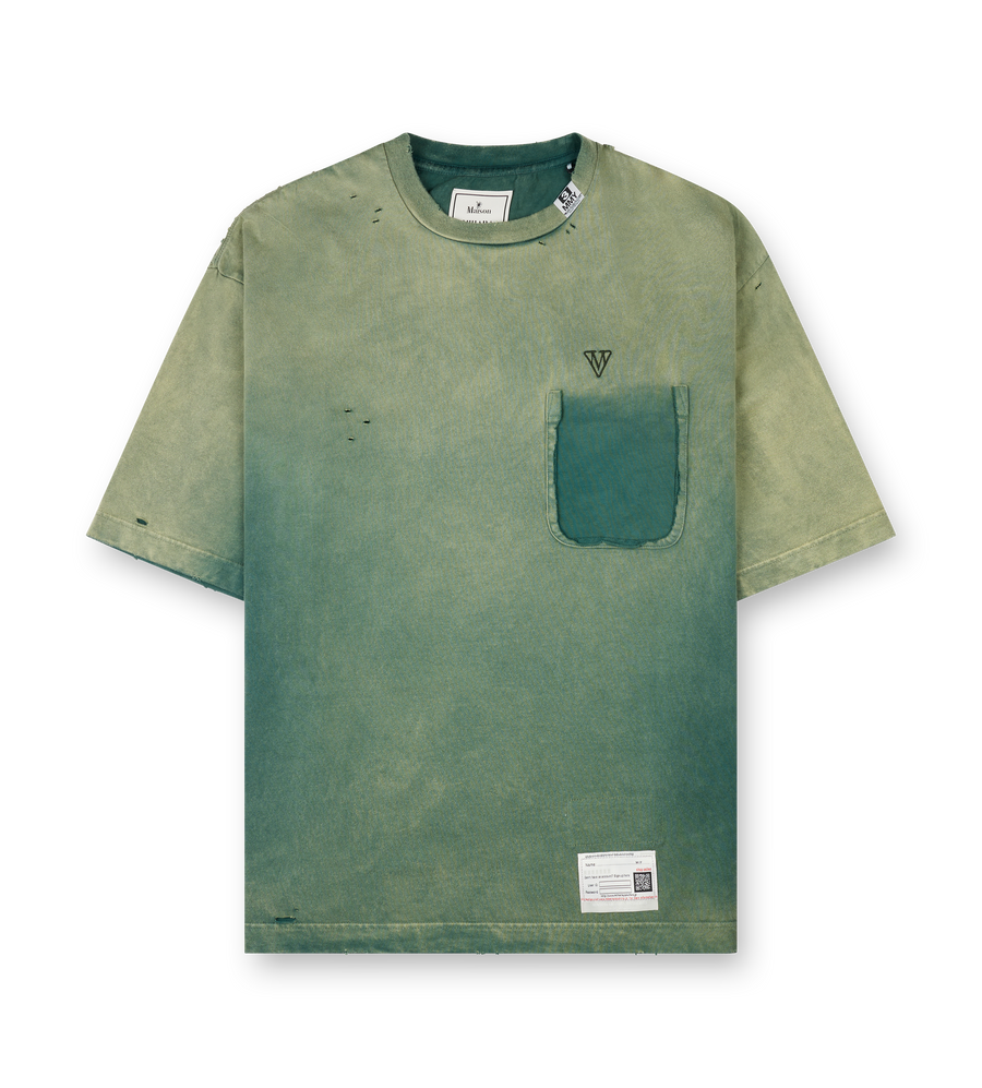 Maison Mihara Yasuhiro green cotton T-shirt with sun-faded distressed finish, torn chest pocket and embroidered logo