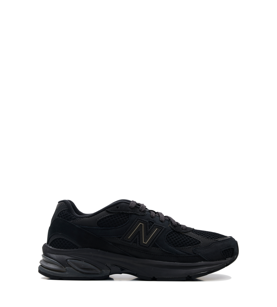 New Balance 2010 sneakers in grey with diamond-knit mesh upper, nubuck overlays, segmented ABZORB midsole and molded “N” logo.
